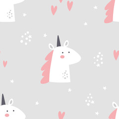 vector seamless pattern with a cute unicorn