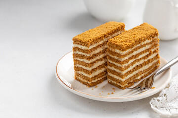 slice of Honey cake on white plate