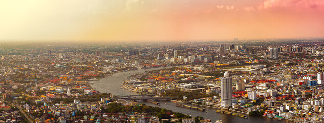 Fototapeta na wymiar Chao Phraya River, bird's eye view and the city of Bangkok which is a high angle image used as a background image