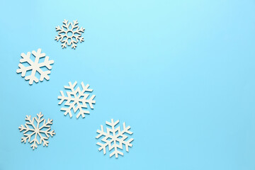 Beautiful different snowflakes on blue background