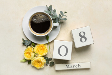 Calendar, cup of coffee and flowers for International Women's Day celebration on light background