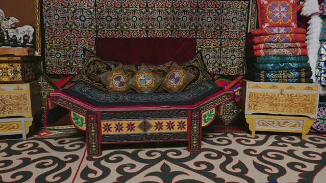 Close up of a central asian style sofa in a decorative yurt.