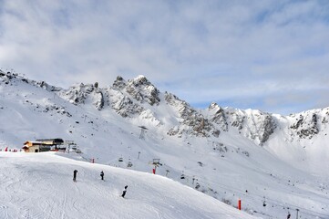 Fototapeta na wymiar skiing people on the slopes of Courchevel 