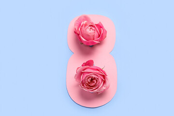 Paper figure 8 with rose flowers on color background