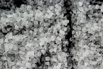 Salt still life on black background