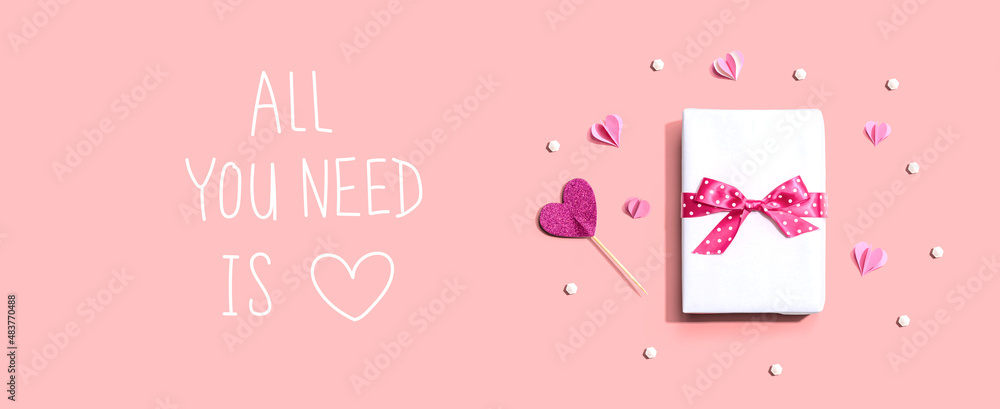 Wall mural all you need is love message with a gift box and paper hearts - Wall murals