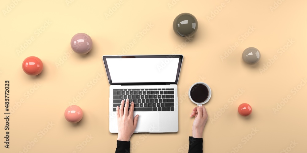 Poster person using a laptop computer with abstract spheres from above