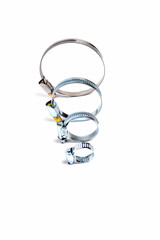 hose clip, round worm tightening clamps on white background,  selective focus