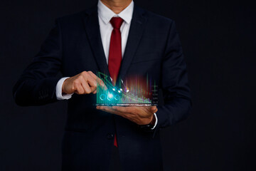 Businessman hand planning and strategy, Stock market, Business growth, progress or success concept. Businessman or trader is showing a growing virtual hologram stock, invest in trading.