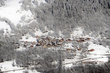 snow covered mountain village in European alps