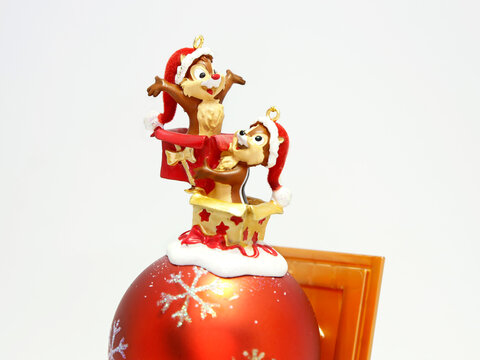 Chip and Dale. Christmas. Disney chipmunks with Christmas clothes and gifts from Santa Claus. Christmas decoration for the tree. Christmas decoration. Chop.