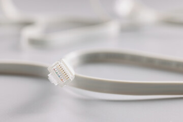 Ethernet LAN carrier and cable on a gray background, wifi