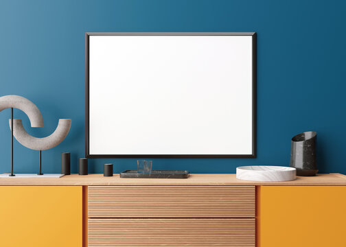 Empty horizontal picture frame on blue wall in modern living room. Mock up interior in minimalist, contemporary style. Free space for your picture, poster. Yellow console. 3D rendering. Close up view.