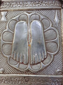 Siver foot print of hindu god, called as foot (charan).