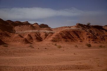 Fototapeta na wymiar The dry arid desert landscape of the Moon Valley in Argentina