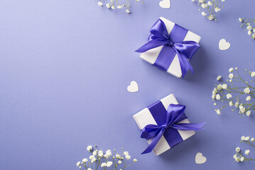 Top view photo of woman's day composition white gypsophila flowers two white gift boxes with violet bows and hearts on isolated pastel lilac background with empty space