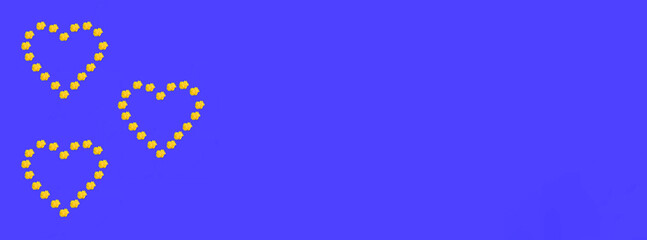 Hearts made of dandelion flowers. Minimal composition on pastel blue background, seamless pattern, romantic Valentines or International Women's day concept, banner with copy space