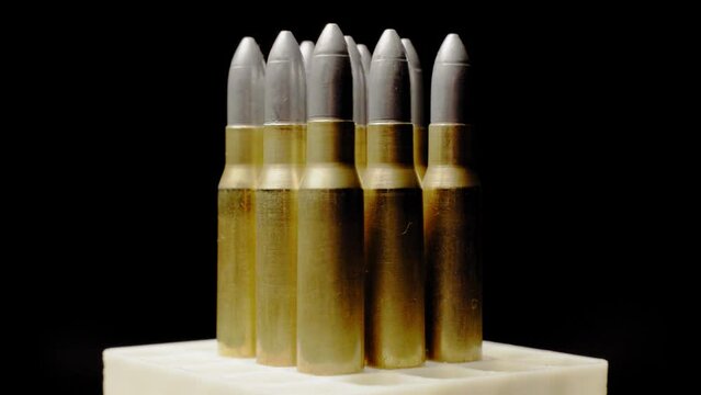 Rifle 308WIN Ammunition Left Justified Rotating, rifle cartridge with leaden bullet, close up