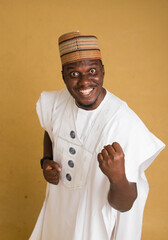 A Traditionally Dressed Northern Business Man Looking Excited