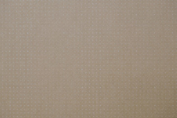 cardboard brown paper and small white dots for texture background or wallpaper for product model 3d surface.