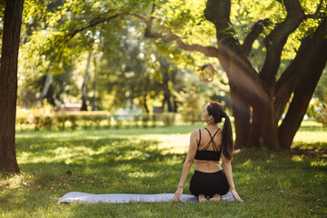 Sporty fit slim woman instructor training hatha yoga , relax breathe. 
