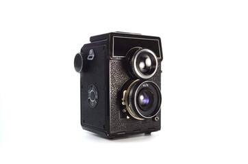 Old film camera isolated on white background.