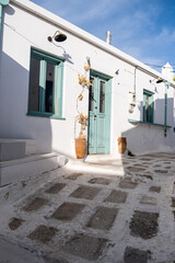 Fototapeta na wymiar Greece, Serifos island. Traditional white building and narrow street, at Chora town Cyclades.