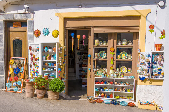 Margarites, Crete, Greece - September 28, 2021 Ceramic workshop with pots handmade ceramic pots and other traditional local products in pottery shop in the village Margarites, Crete, Greece, Europe