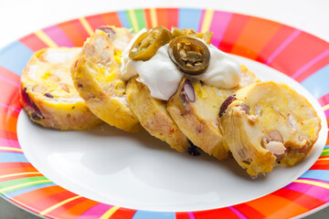 bean dumplings with sour cream and jalapenos