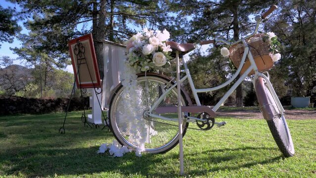 Bicycle decorated with beautiful flowers in the park 