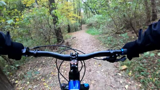 Amateur enduro rider on the bicycle in the spring season