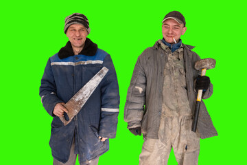Two bad unskilled builder workers in bad dirty tattered uniform with bad tools. Concept of...