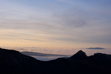 Fototapeta na wymiar Sunset in the mountains. Trip to the mountains. Mountain hikes.
