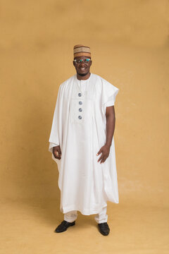 A Traditionally Dressed Northern Business Man Standing