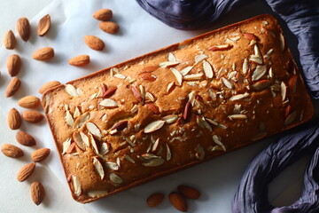 Ghee cake. Vanilla flavoured ghee cake with almonds on top. The perfect accompaniment for a cup of coffee