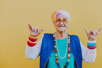 Funny grandmother portraits. 80s style outfit. trapstar dance on colored backgrounds. Concept about...