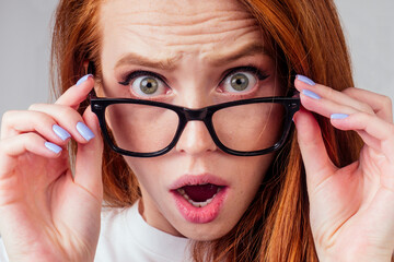 annoying redhaired ginger woman feeling irritation and anger studio background
