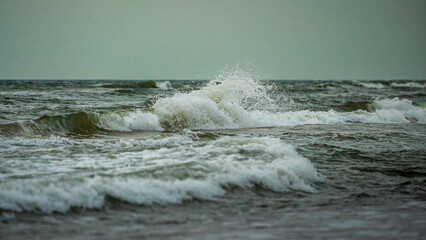 waves in the sea with white foam