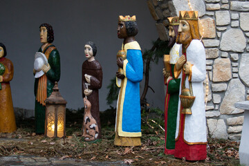Fototapeta na wymiar Wroclaw, Poland - January 30, 2022: Wooden figures of the three wise men who came to the baby Jesus at the Church of the Blessed Virgin Mary, Mother of Consolation