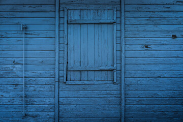 blue wooden window with shutters