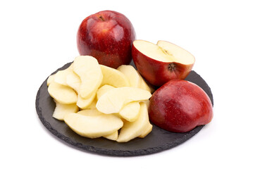 Red delicious apple with apple slices, isolated on white background.