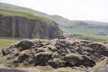 Green Grassy mountain Landscape in the highlands. Travel and nature on a beautiful cold day