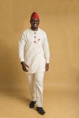 Yoruba Culturally Dressed Business Man stepping forward