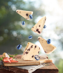 Fresh tasty cheese fall in the air