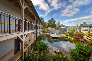 View from terrace of modern hotel with garden pond