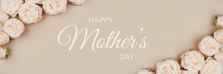 Spring background. Rose flowers on a beige background.