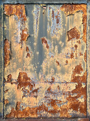 fragment of rusty or weathered iron, decorative panel, aged material, texture or source