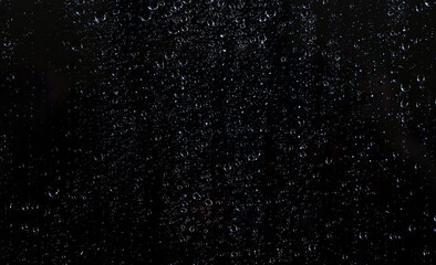 Water droplets on black background.  © surasak