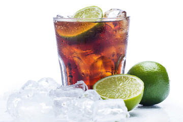 Glass of cold Cuba Libre highball cocktails or coke with ice cubes