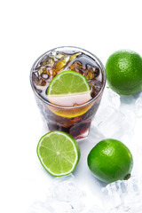 Glass of cold Cuba Libre highball cocktails or coke with ice cubes